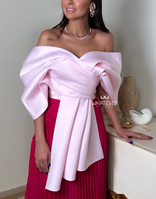 Blush Serenity: An Off-the-Shoulder Top with a Dramatic Satin Bow.